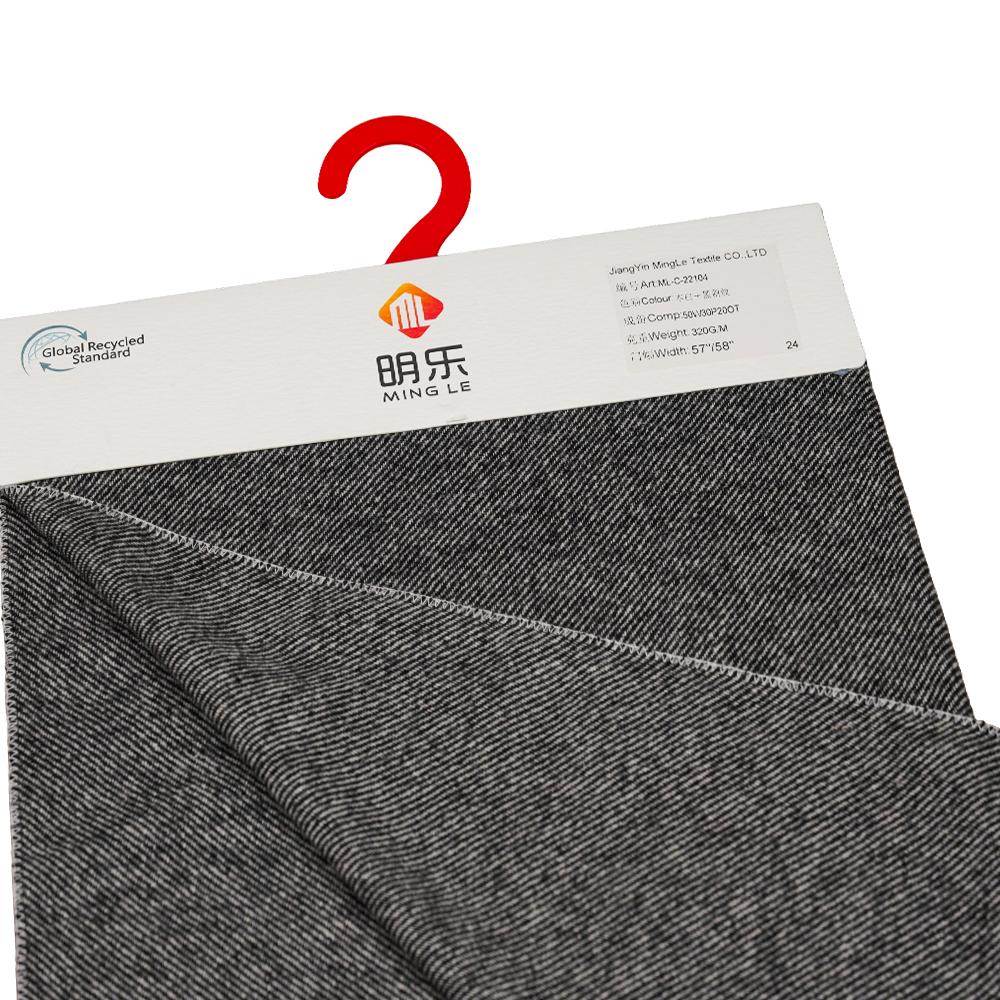 50 % lana, 30 % poliéster, 20 % otra fibra, 320 g/m, blanquecino + negro, tela de franela de sarga, ML-C-22104